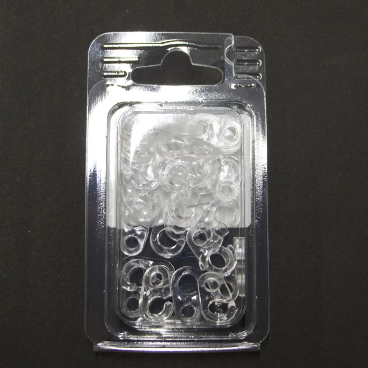 Giesse Scampoli Accessori Per Tende>Ganci plastica con occhiello mm. 7